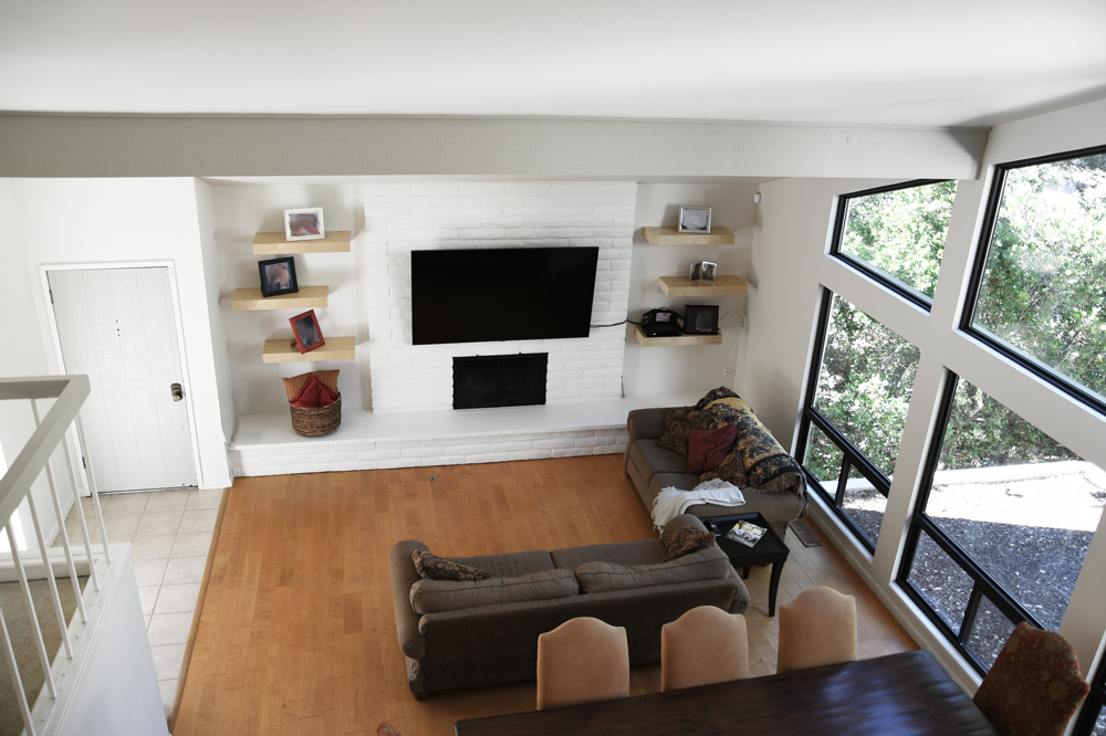 Two story living room with fireplace